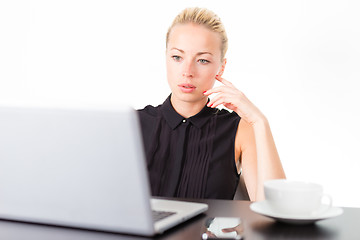 Image showing Business woman with cup of coffee.