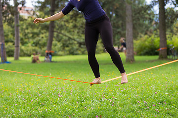 Image showing Slack line in the city park.