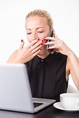 Image showing Business woman yawning.