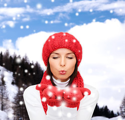 Image showing smiling young woman in winter clothes