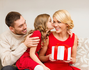 Image showing adorable child kisses her mother