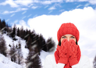 Image showing smiling young woman in winter clothes