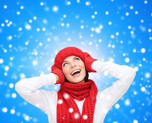 Image showing smiling young woman in winter clothes