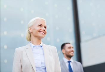 Image showing close up of smiling businessmen