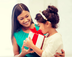 Image showing happy mother and child girl with gift box