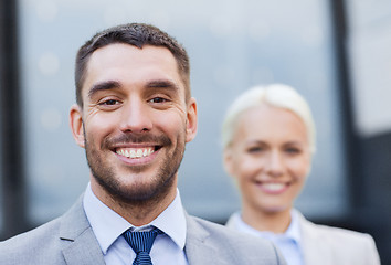 Image showing close up of smiling businessmen