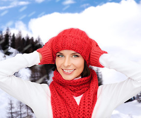 Image showing smiling young woman in winter clothes