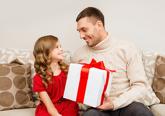 Image showing smiling father and daughter looking at each other