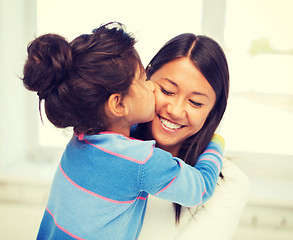 Image showing hugging mother and daughter