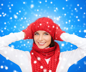 Image showing smiling young woman in winter clothes