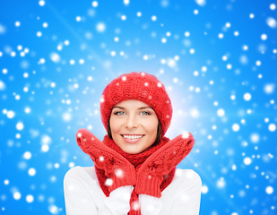 Image showing smiling young woman in winter clothes