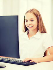 Image showing student girl with computer at school