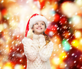 Image showing dreaming girl in santa helper hat