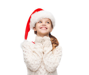 Image showing dreaming girl in santa helper hat