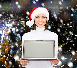 Image showing woman in santa helper hat with laptop computer