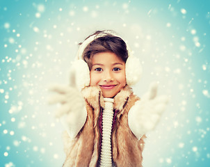 Image showing happy littl girl in winter clothes