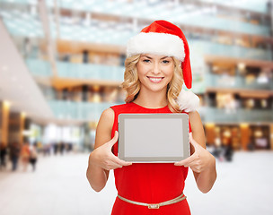 Image showing woman in santa helper hat with tablet pc