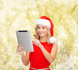 Image showing woman in santa helper hat with tablet pc