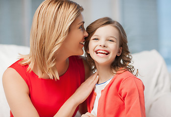 Image showing mother and daughter cuddling