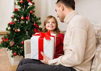 Image showing smiling father and daughter looking at each other