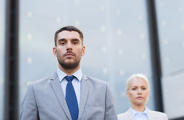 Image showing businessman and businesswoman outdoors