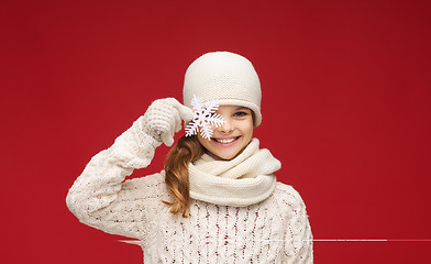 Image showing girl with big snowflake