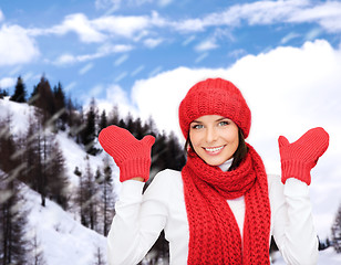 Image showing smiling young woman in winter clothes