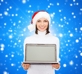 Image showing woman in santa helper hat with laptop computer