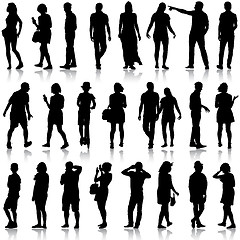 Image showing Black silhouettes of beautiful mans and womans on white backgrou