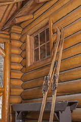 Image showing vintage skis leaning against wall