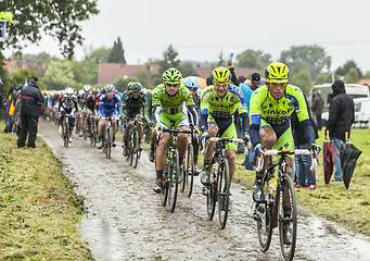 Image showing The Peloton on a Cobbled Road- Tour de France 2014