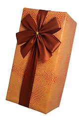 Image showing beautifully decorated gift box with bow over white