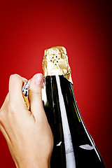 Image showing Opening champagne bottle