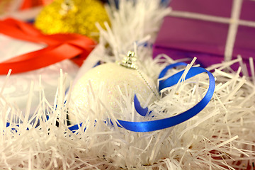 Image showing Christmas background with red and blue ribbon and white balls