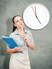 Image showing business woman with a blue folder