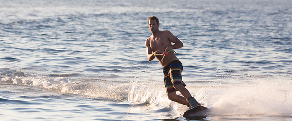 Image showing Wakeboarder in sunset.