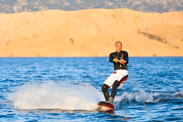 Image showing Wakeboarder in sunset.