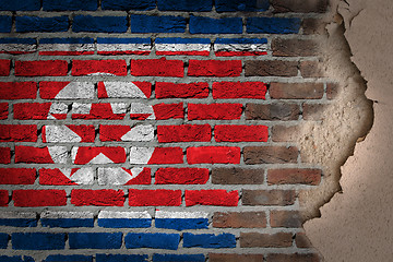 Image showing Dark brick wall with plaster - North Korea