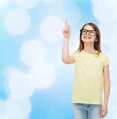 Image showing smiling cute little girl in black eyeglasses