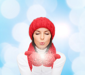 Image showing smiling young woman in winter clothes