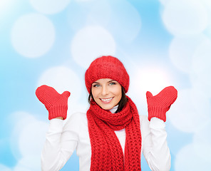 Image showing smiling young woman in winter clothes