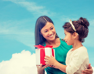 Image showing happy mother and child girl with gift box