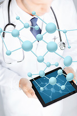 Image showing close up of doctor with stethoscope and tablet pc