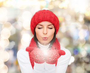 Image showing smiling young woman in winter clothes