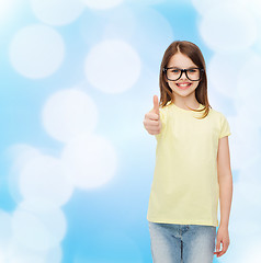 Image showing smiling cute little girl in black eyeglasses