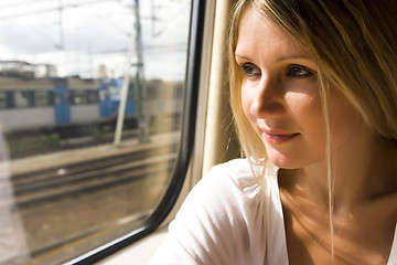 Image showing young woman in vintage train