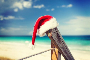 Image showing close up of santa helper hat on beach