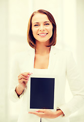 Image showing businesswoman with tablet pc in office