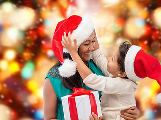 Image showing happy mother and child girl with gift box