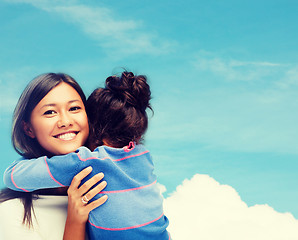 Image showing hugging mother and daughter